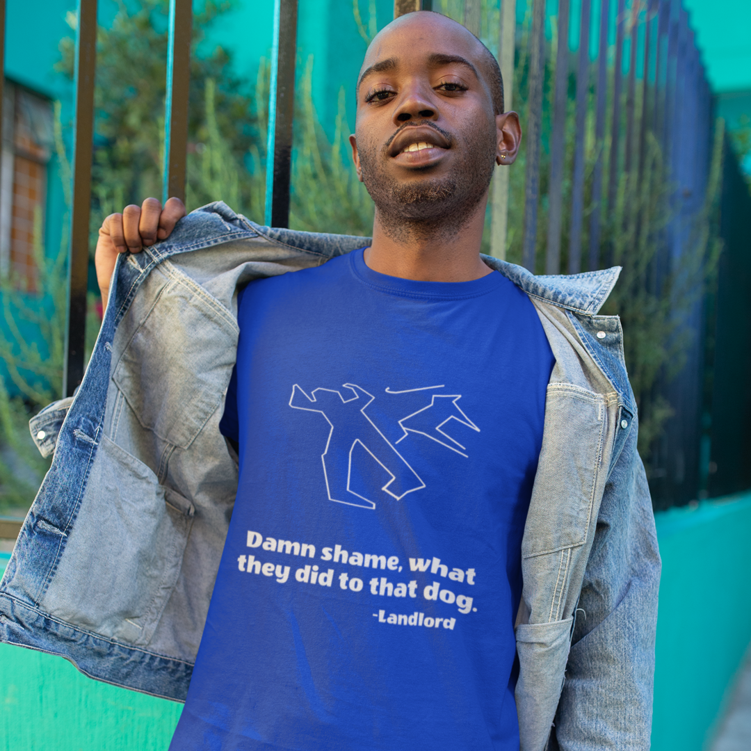 African American Man Wearing Blue Tee Shirt With Outline of Person with Cane and Dog, Text Says "Damn shame, what they did to that dog. - Landlord"