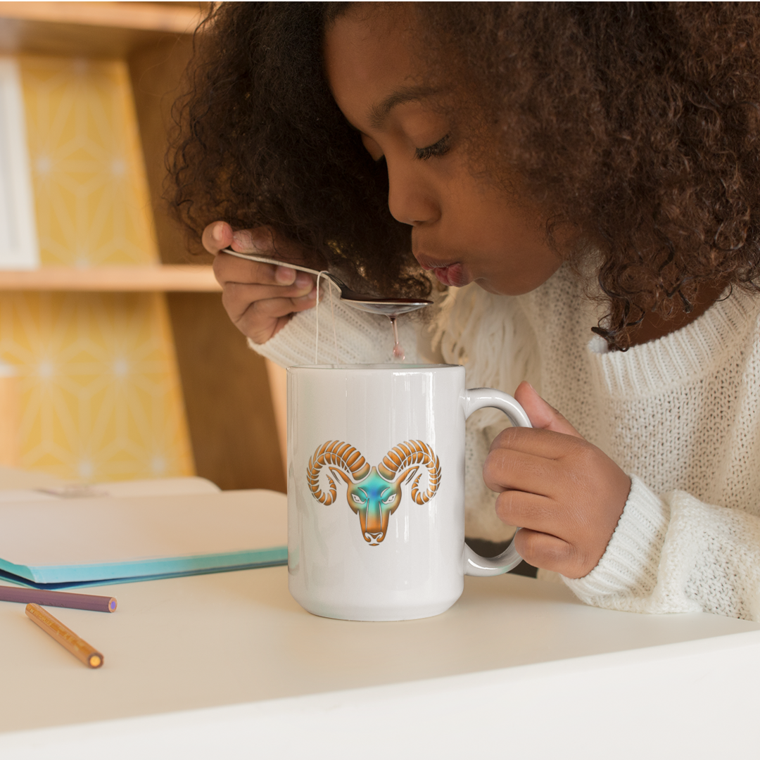 Young Girl Cooling Drink in Spoon from a 15oz White Ceramic Mug with Aries Symbol